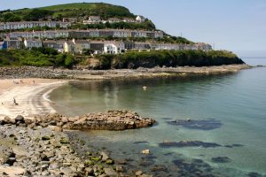 Houses perched on coastline above